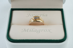 Anillo con circones azules en oro 18 quilates Anillo con circones azules en oro 18 quilates