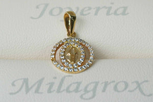 Dije virgen Milagrosa con circones blancos en oro 18 quilates Dije virgen Milagrosa con circones blancos en oro 18 quilates