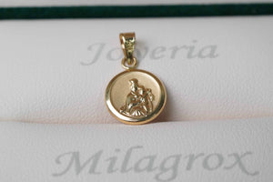 Dije virgen del Carmen en oro 18 quilates. Dije virgen del Carmen en oro 18 quilates.