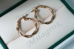 Candongas espiral en oro rosado 18 quilates Candongas espiral en oro rosado 18 quilates