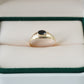 Anillo  ramas con circon negro en oro 18 quilates