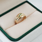 Anillo con circones verdes en oro 18 quilates