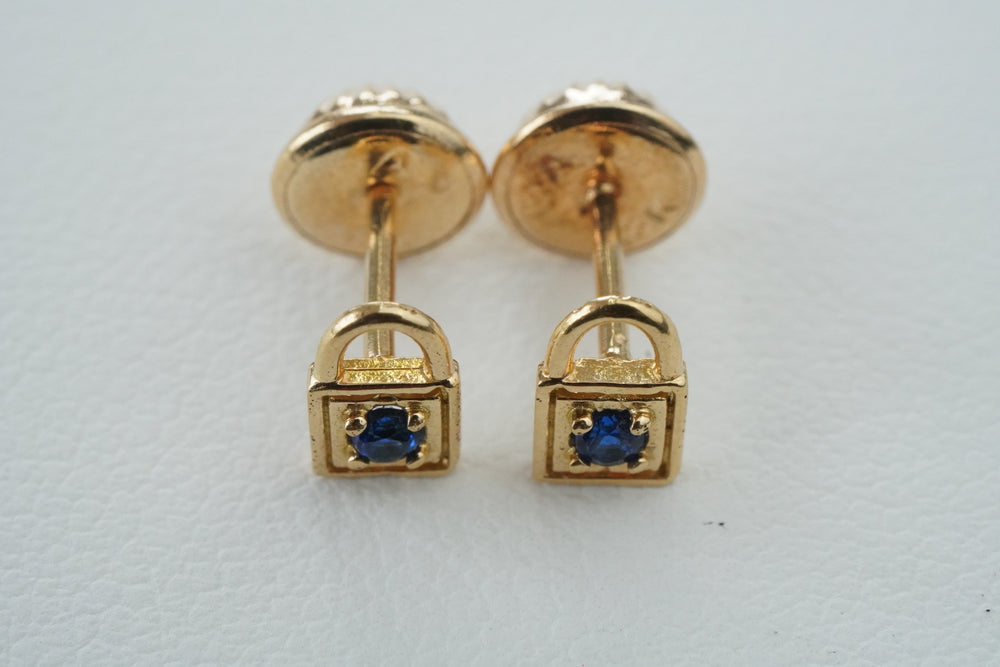 Topos candados pequeños con circón azul