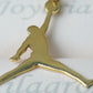 Dije Jordan en oro 18 quilates