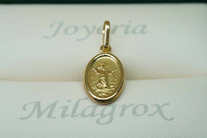 Dije divino niño en oro 18 quilates