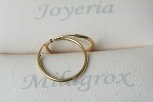 Candongas lisas en oro 18 quilates